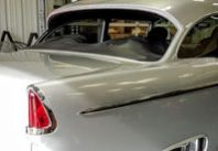Broken back windshield of custom sedan